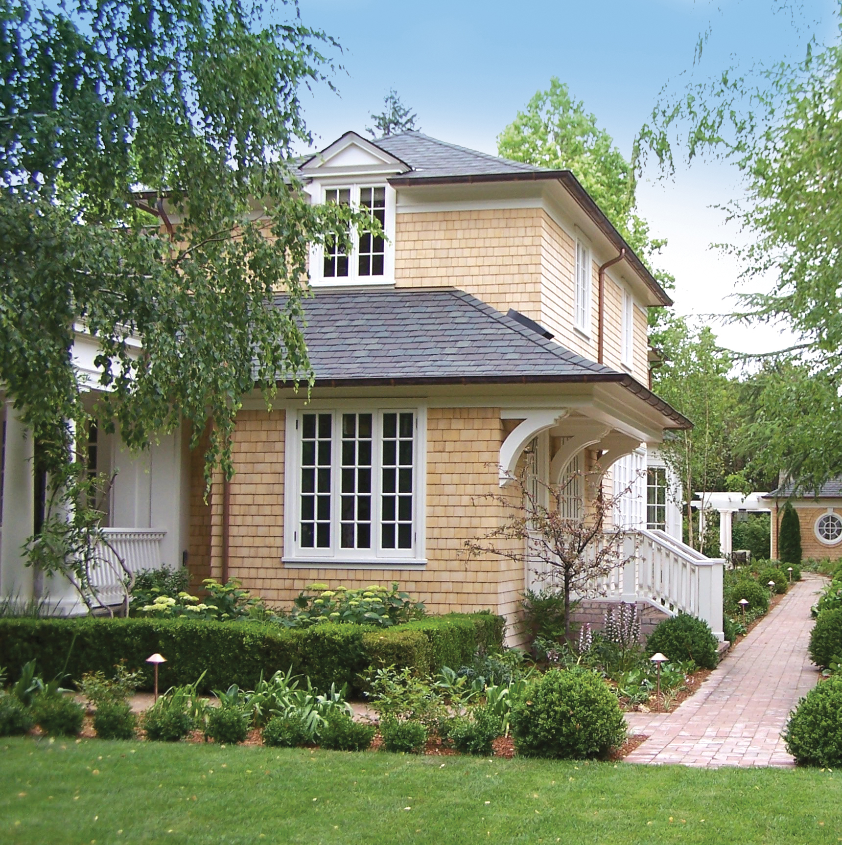 Home featuring Waska eastern white cedar shingles exterior siding